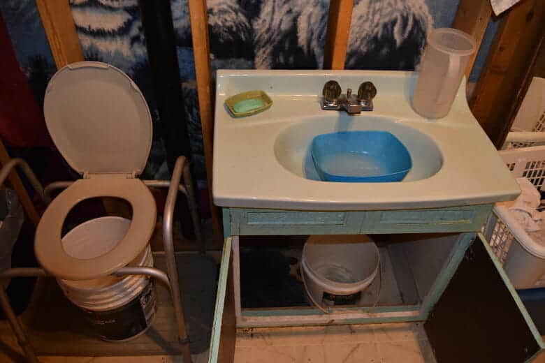 photo: bathroom sink and toilet with no plumbing