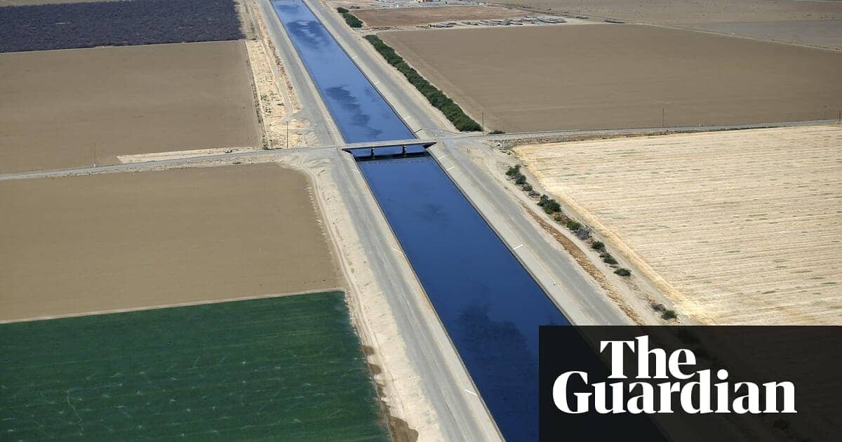 photo: water aqueduct in California's Central Valley. Sinking land, poisoned water: the dark side of California's mega farms