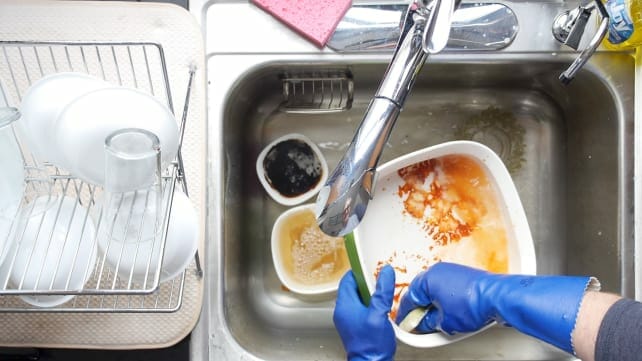 Does a dishwasher use less water than washing dishes by hand?