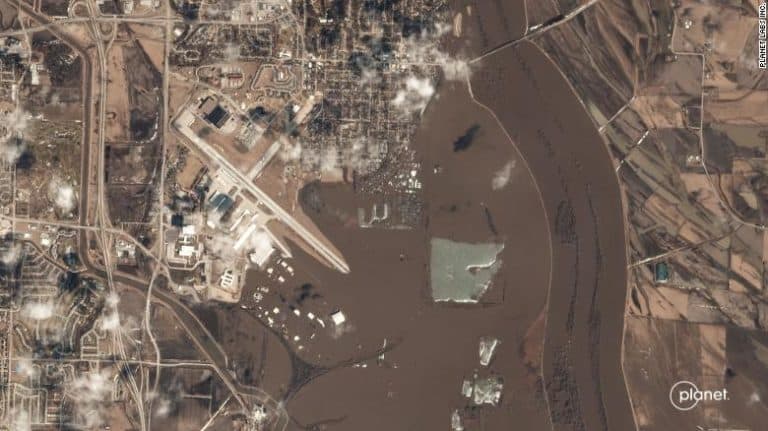 Satellite images show Nebraska and Iowa rivers swallowing towns