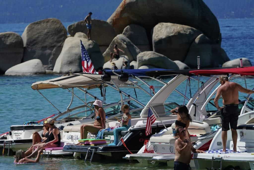 photo: Holiday weekends in Tahoe draw hordes of visitors to the lake basin, which locals say is both a blessing and a curse.
